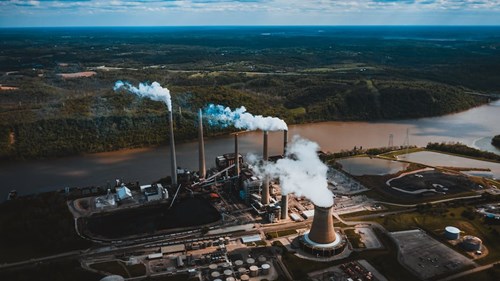 Factories polluting with carbon emissions